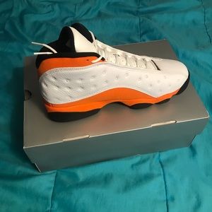 SOLD. BRAND NEW jordan 13 starfish. Orange/white